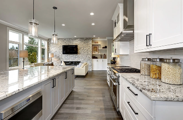 Contemporary Open Kitchen Design with Emerald Cabinets and Marble Countertop